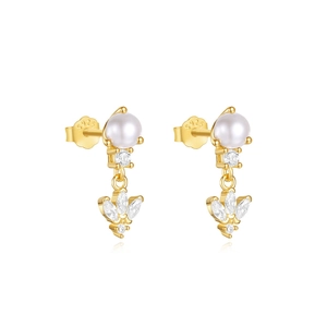 Detailed macro view of S925 sterling silver gold earrings with pearls and zircon stones