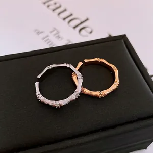 Ensemble de bagues ouvertes style bambou en argent et or rose avec incrustations