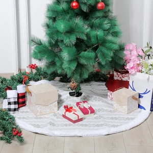 48-inch white knitted Christmas tree skirt with snowflake patterns in cozy home setting