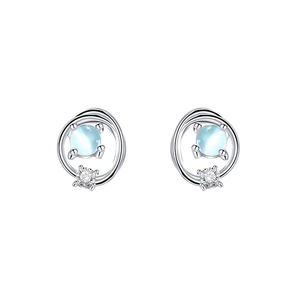Cosmos Saturn stud earrings featuring blue glass stones and silver nested double rings