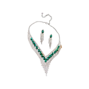 Elegant silver V-shaped necklace and drop earrings set with green teardrop stones