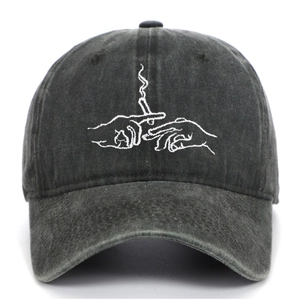 Detail of vintage washed charcoal baseball cap with white creative hand embroidery