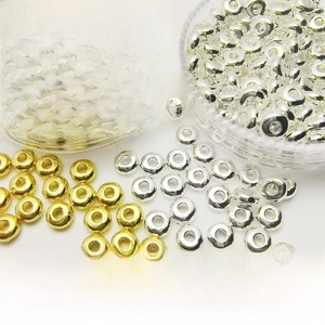 Detail of durable gold and silver alloy spacer beads with nano-plating for DIY jewelry
