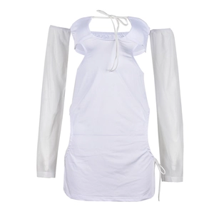 Detail of white cutout bodycon dress featuring matching sleeves and lace-up details