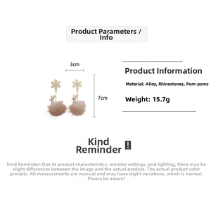 Detail view of rhinestone snowflake reindeer earrings with dimensions 3cm by 7cm