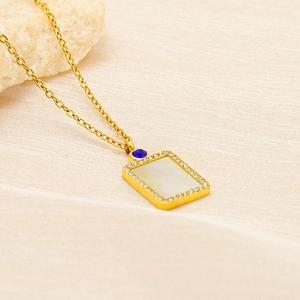 Gold rectangular pendant necklace with white shell inlay and blue zircon stone detail