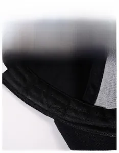 Macro detail of the wide moisture-wicking sweatband inside the black vintage baseball cap