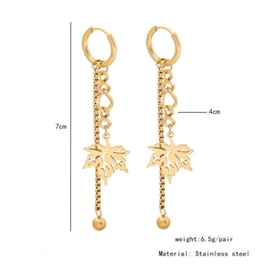 Macro view of gold maple leaf drop earrings with stainless steel chain and dimensions