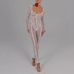 Close-up detail of white lace stitching and corset lines on long sleeve bodysuit jumpsuit