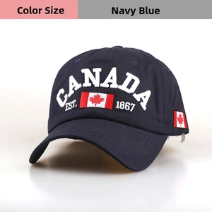 Detailed embroidery of Canada flag and white letters on navy cotton baseball cap