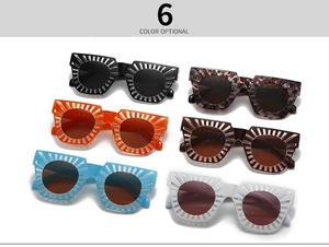 Detailed view of six colorful square sunglasses with geometric frames on white backdrop