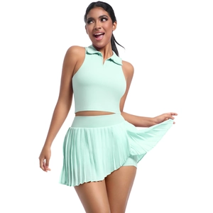 Ensemble de tennis vert menthe pour femme avec polo sans manches et jupe plissée