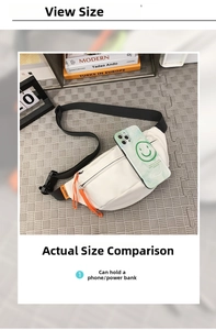 Compact white waterproof waist bag with orange zipper pull next to a smartphone