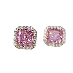 Luxury gold halo stud earrings featuring square pink gemstones and white crystals