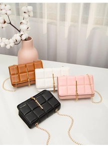Quilted flap crossbody bags in four colors with gold chain straps and tassel details