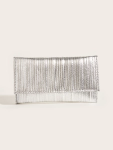 Detailed view of silver rectangular evening clutch featuring a pleated metallic texture