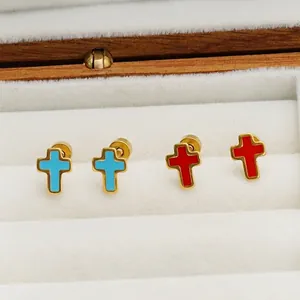 Fashionable stainless steel cross stud earrings in blue and red enamel with gold finish