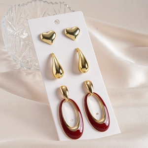 6-piece gold drip oil heart and waterdrop earring set displayed on white card