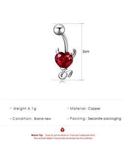Detail view of heart-shaped belly button ring with devil wings and dimensions