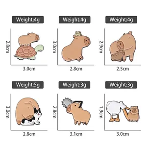 Set of six colorful capybara enamel pins featuring turtles frogs and chainsaws