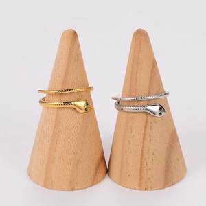 French vintage snake rings in gold and silver with green eyes and scale textures