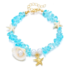 Bohemian seashell and starfish bracelet with sky blue stones and pearl accents