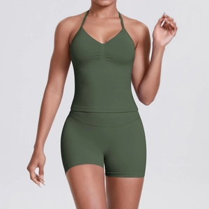 Close-up of olive green seamless yoga set featuring a halter V-neck top and high waist shorts