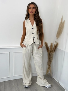 Chic beige pinstripe two-piece set featuring V-neck vest and matching wide-leg trousers