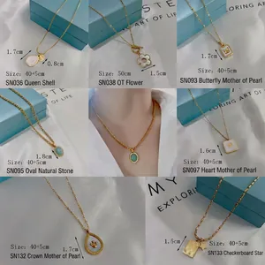 Collection of gold butterfly and heart necklaces with pearl and stone charms for women