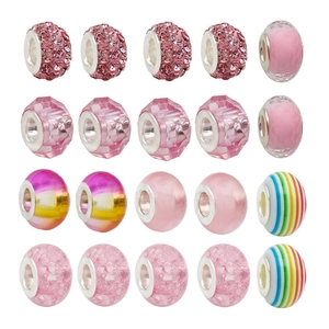 Macro detail of 20 pink assorted large hole beads with crystals and faceted glass textures