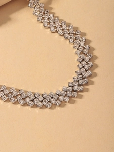 Detail shot of shimmering multi-layer rhinestone choker necklace with silver-tone mesh