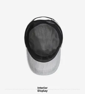 Interior view of gray men's flat top sun hat with breathable lining details.