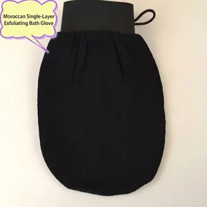 Moroccan style black exfoliating bath glove with coarse sand texture and elastic wrist