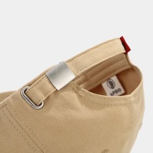 Rear view of khaki cotton baseball cap featuring an adjustable metal buckle and APDO label