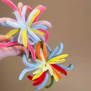 Colorful plush firework hair clip with vibrant twisted pipe cleaners and elegant design