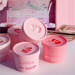 Pink fragrance gel air freshener jars displayed against a matching aesthetic background