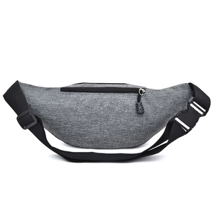 Close-up of grey textured nylon waist bag with zipper detail and adjustable buckle