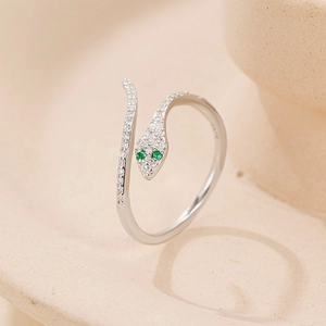 925 Sterling Silver snake ring with green zircon eyes and crystal pavé in open design
