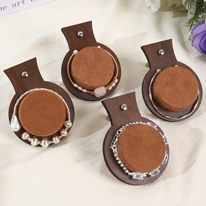 Walnut wood jewelry display trays with brown velvet inserts for bracelets and bangles