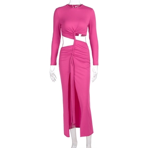 Detail of fuchsia bodycon dress with side cutout, waist twist and high leg slit