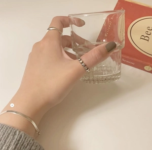 Minimalist 925 sterling silver ring set and snake chain bracelet for a chic everyday look