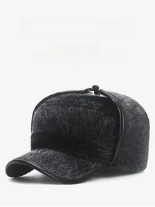 Detail of warm winter trapper hat with thick faux fur lining and ear protection