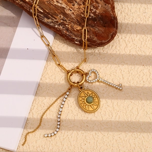 18K gold-plated paperclip chain necklace with sun pendant, green gemstone and diamond key