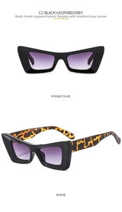 Dettaglio di occhiali da sole cat-eye con montatura nera e aste con stampa leopardata