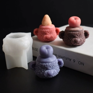 Macro detail of bear-shaped silicone mold showing realistic plush textures and fruit details