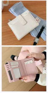 Detail view of folding wallet showing interior card slots, photo window and zipper pocket