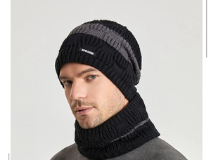 Detail of knitted winter beanie and scarf set with thick texture and brand logo
