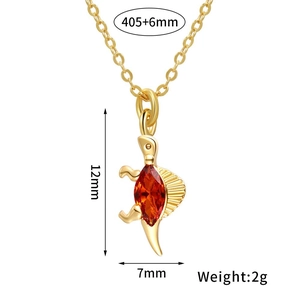 Detail showing dimensions and 18K gold plated dinosaur pendant with red gemstone