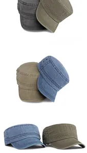 Detail van gewassen katoenen legerpetten in grijs, olijf, kaki en denimblauw