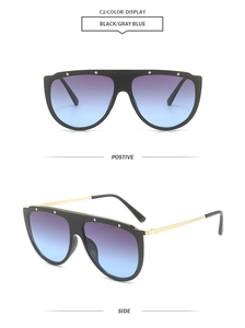 Front and side view of oversized oversized sunglasses with gradient blue lenses and gold arms